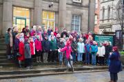 busking-for-water-aid-december-2011 6994562175 o